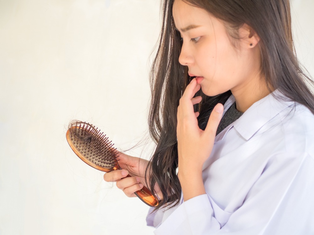 Unraveling the Tangles: 10 Surprising Reasons Behind Hair Loss in Women